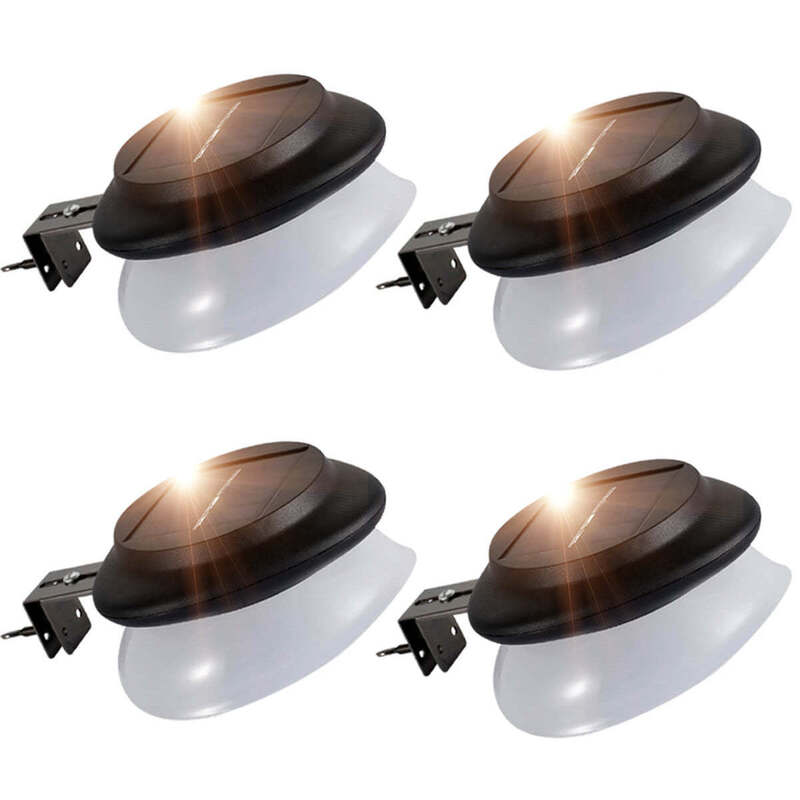 Paquete de 4 luces solares para canalones de grado comercial construidas con materiales impermeables y células solares que garantizan el rendimiento en aplicaciones de iluminación exterior